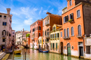 Narrow Canal with Gondolas in Venice